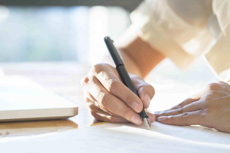 asian-business-woman-signing-contract-document-making-deal (1)